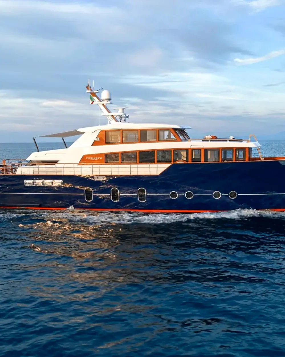 Motor yacht at anchor off the coast